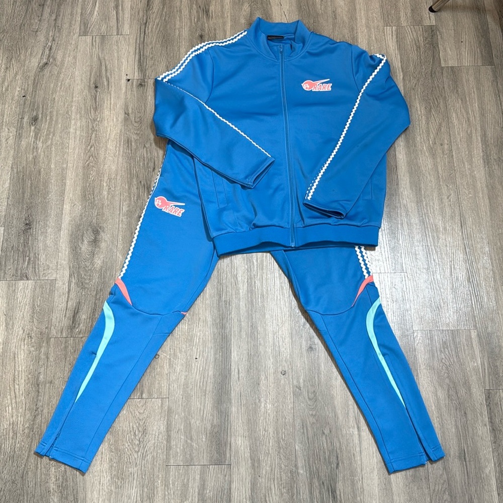 Rare Pink dolphin, tracksuit, salmon, and blue great condition. Awesome peace.
